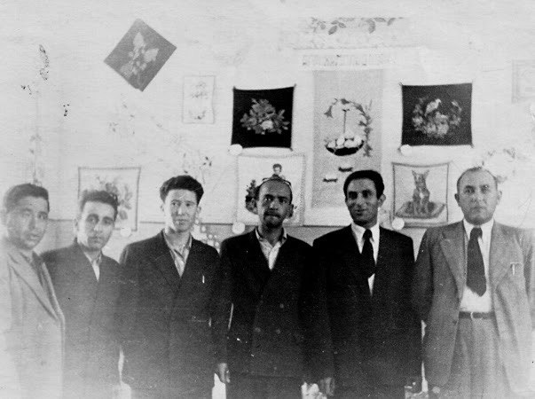 With colleagues at an exhibition